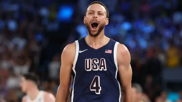 Stephen Curry #4 of Team United States reacts after a three point basket during the Men's Gold Medal game between Team France and Team United States on day fifteen of the Olympic Games Paris 2024 at Bercy Arena on August 10, 2024 in Paris, France.
