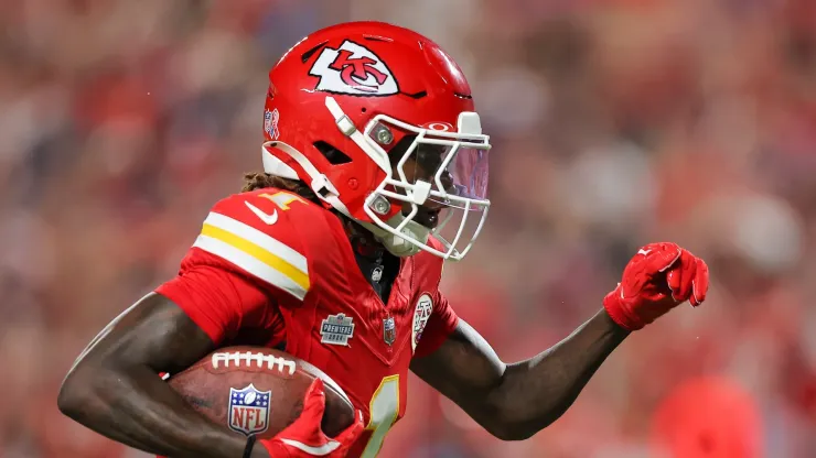 Xavier Worthy #1 of the Kansas City Chiefs runs to score a touchdown against the Baltimore Ravens during the first quarter at GEHA Field at Arrowhead Stadium on September 05, 2024 in Kansas City, Missouri.
