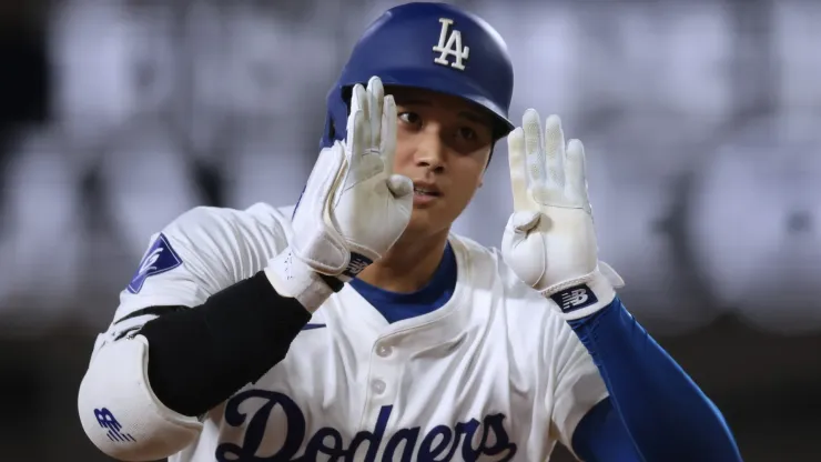 Shohei Ohtani #17 of the Los Angeles Dodgers reacts to his solo home run, his 45th of the season to trail 2-1 to the Cleveland Guardians, during the sixth inning at Dodger Stadium on September 06, 2024 in Los Angeles, California.
