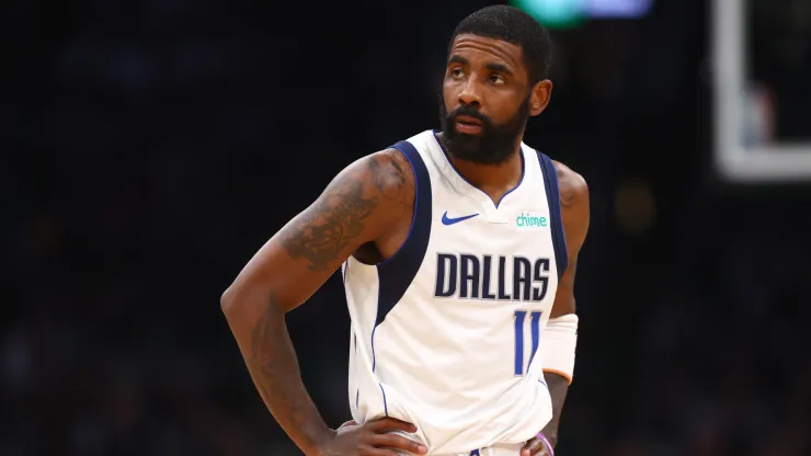 Kyrie Irving #11 of the Dallas Mavericks looks on during the first quarter against the Boston Celtics
