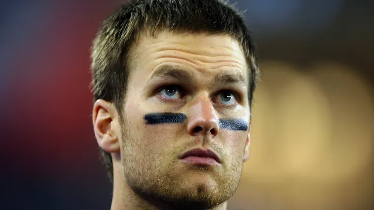 Tom Brady #12 of of the New England Patriots waits on the field before taking on the New York Giants during Super Bowl XLII on February 3, 2008 at the University of Phoenix Stadium in Glendale, Arizona.
