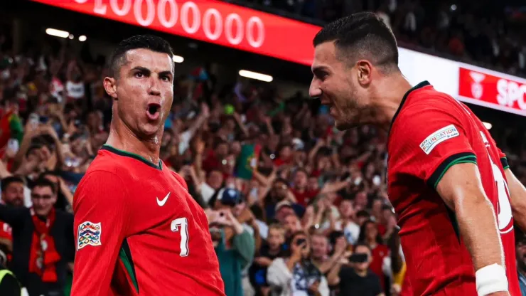 Cristiano Ronaldo (left) celebrates his goal for Portugal against Scotland.
