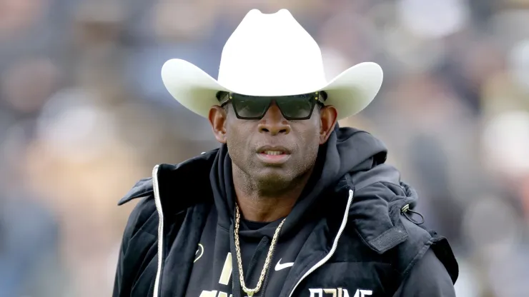  Head coach Deion Sanders of the Colorado Buffaloes watches as his team warms up prior to their spring game at Folsom Field on April 22, 2023 in Boulder, Colorado. 
