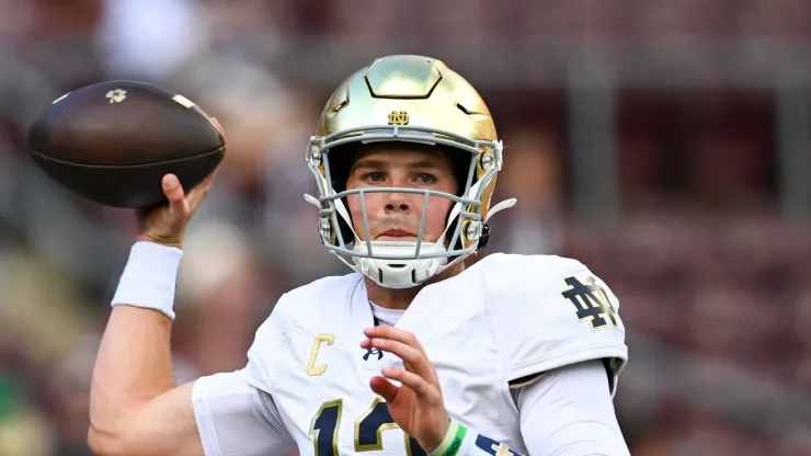 COLLEGE STATION, TEXAS - AUGUST 31: Riley Leonard #13 of the Notre Dame Fighting Irish warms up prior to the game against the Texas A&M Aggies at Kyle Field. 
