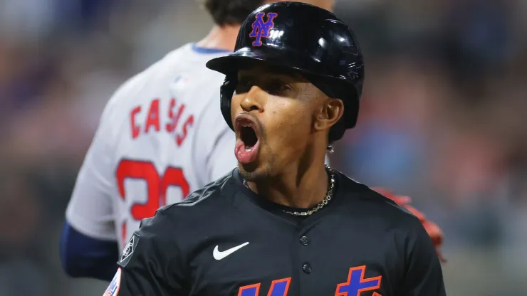 Francisco Lindor #12 of the New York Mets celebrates after hitting an RBI single in the fourth inning against the Boston Red Sox at Citi Field.
