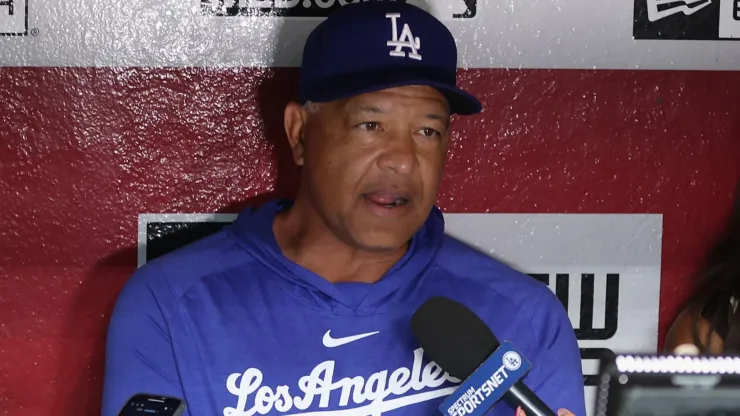 Manager Dave Roberts #30 of the Los Angeles Dodgers speaks with the media before the MLB game against the Arizona Diamondbacks at Chase Field.
