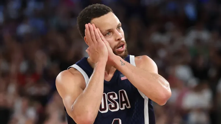  Stephen Curry #4 of Team United States reacts after a three point basket during the Men's Gold Medal game between Team France and Team United States on day fifteen of the Olympic Games Paris 2024 at Bercy Arena on August 10, 2024 in Paris, France.
