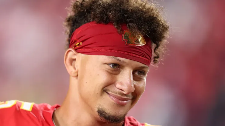 Quarterback Patrick Mahomes #15 of the Kansas City Chiefs smiles after their 27-20 win over the Baltimore Ravens at GEHA Field at Arrowhead Stadium on September 05, 2024 in Kansas City, Missouri.
