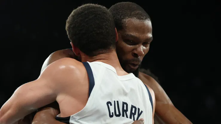 Kevin Durant #7 and Stephen Curry #4 of Team United States react after winning against Team Serbia during a Men's basketball semifinals match between Team United States and Team Serbia on day thirteen of the Olympic Games Paris 2024 at Bercy Arena on August 08, 2024 in Paris, France.
