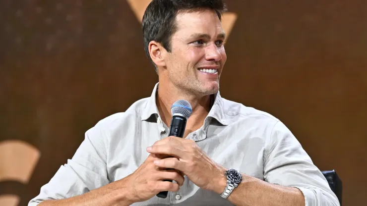 Tom Brady speaks at the Fanatics Fest NYC 2024 at Jacob Javits Center on August 16, 2024 in New York City.
