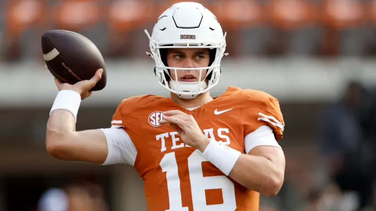 Arch Manning #16 of the Texas Longhorns warms up before the game against the UTSA Roadrunners at Darrell K Royal-Texas Memorial Stadium on September 14, 2024 in Austin, Texas.
