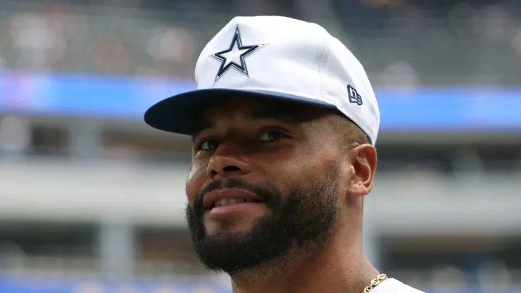 Dak Prescott #4 of the Dallas Cowboys smiles before a preseason game against the Los Angeles Rams at SoFi Stadium on August 11, 2024 in Inglewood, California.
