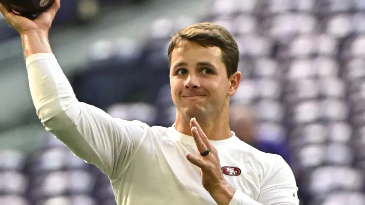 Quarterback Brock Purdy #13 of the San Francisco 49ers warms up prior to a game against the Minnesota Vikings at U.S. Bank Stadium on September 15, 2024 in Minneapolis, Minnesota.
