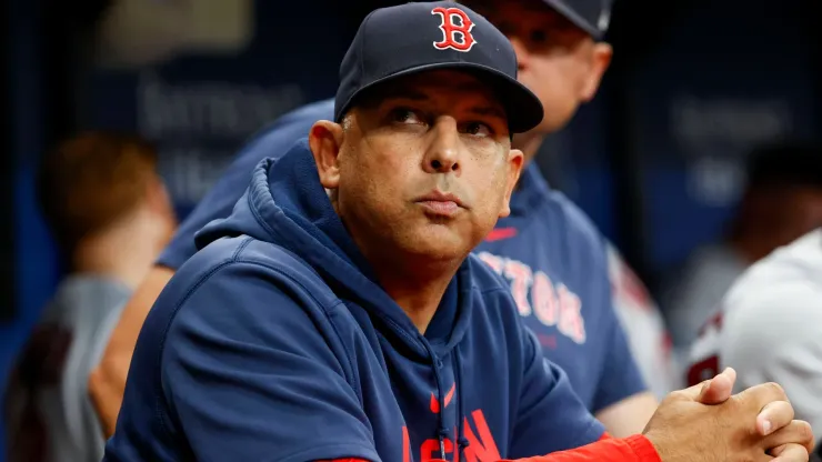 Boston Red Sox manager Alex Cora (13) looks on from the dugout in the ninth inning against the Tampa Bay Rays at Tropicana Field in St. Petersburg.
