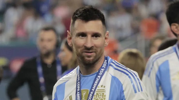 Lionel Messi celebrating Argentina's 2024 Copa America after defeating Colombia 1-0  at Hard Rock Stadium in Miami, Florida.
