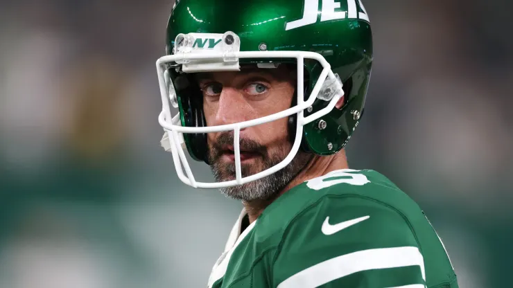 Aaron Rodgers #8 of the New York Jets looks on before the game against the New England Patriots during their game at MetLife Stadium on September 19, 2024 in East Rutherford, New Jersey.
