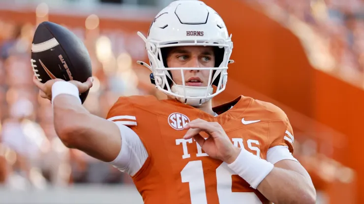 Arch Manning #16 of the Texas Longhorns warms up before the game against the Louisiana Monroe Warhawks at Darrell K Royal-Texas Memorial Stadium on September 21, 2024 in Austin, Texas.
