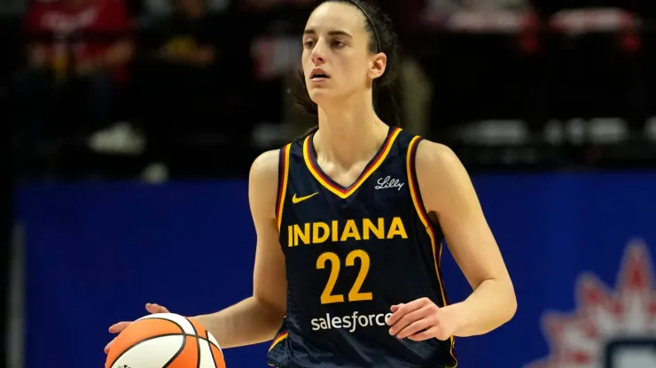 Caitlin Clark #22 of the Indiana Fever advances the ball during the second half of a first-round WNBA playoff game against the Connecticut Sun at Mohegan Sun Arena on September 22, 2024 in Uncasville, Connecticut. The Sun defeated the Fever 93-69.
