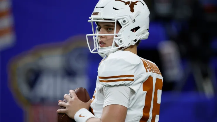 Arch Manning #16 of the Texas Longhorns warms up prior to playing against the Washington Huskies during the CFP Semifinal Allstate Sugar Bowl at Caesars Superdome on January 01, 2024 in New Orleans, Louisiana.
