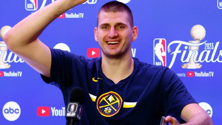 Nikola Jokic #15 of the Denver Nuggets speaks with media after a 94-89 victory against the Miami Heat in Game Five of the 2023 NBA Finals to win the NBA Championship at Ball Arena on June 12, 2023 in Denver, Colorado. 
