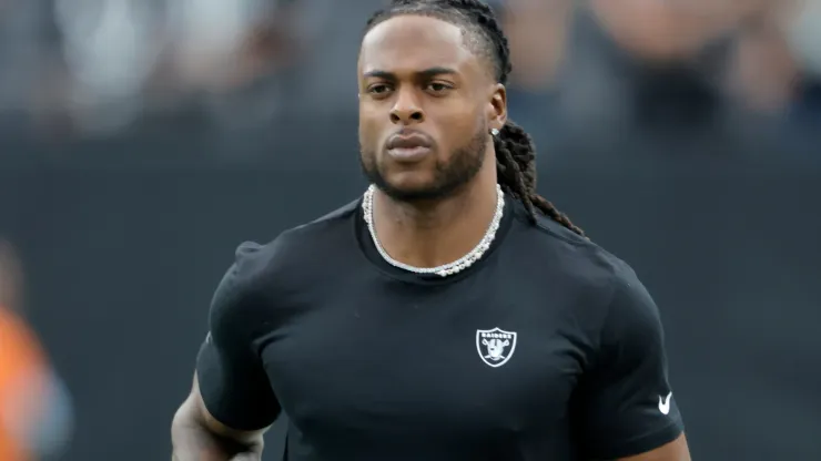 Davante Adams #17 of the Las Vegas Raiders warms up before a game between the Las Vegas Raiders and Carolina Panthers at Allegiant Stadium on September 22, 2024 in Las Vegas, Nevada.
