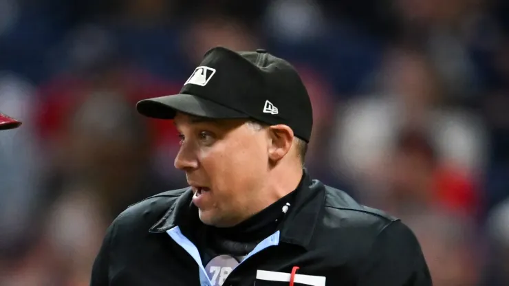 Home plate umpire Adam Hamari during the Guardians-Rangers ninth inning at Progressive Field on August 23, 2024 in Cleveland, Ohio. 
