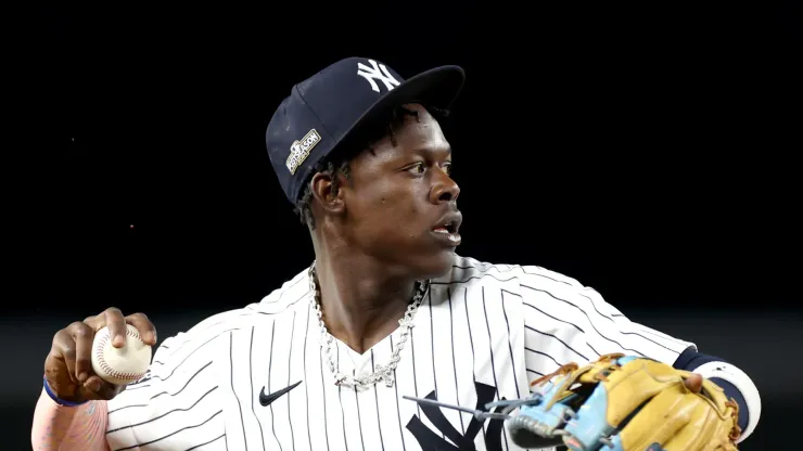 Jazz Chisholm Jr. #13 of the New York Yankees fields the ball against the Kansas City Royals during the seventh inning in Game One of the Division Series at Yankee Stadium on October 05, 2024 in New York City. 
