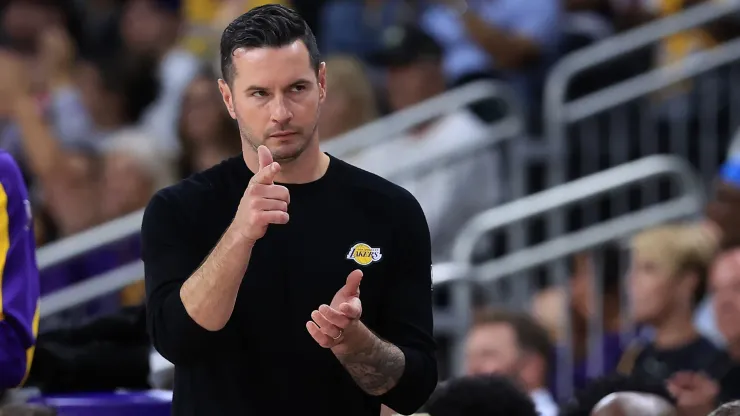 Los Angeles Lakers Head Coach JJ Redick looks on from the bench during the second half of a game against the Minnesota Timberwolves
