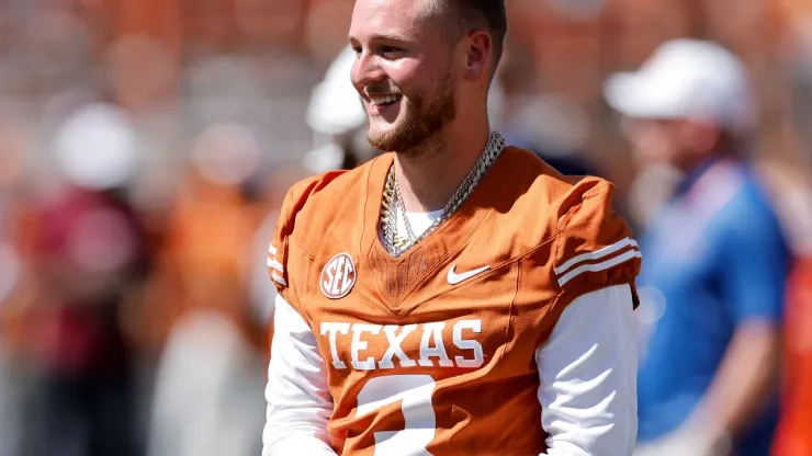 Quinn Ewers #3 of the Texas Longhorns watches players warm up before the game against the Mississippi State Bulldogs at Darrell K Royal-Texas Memorial Stadium on September 28, 2024 in Austin, Texas.
