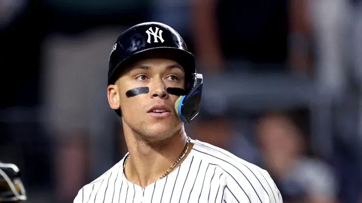 Aaron Judge #99 of the New York Yankees reacts after striking out against the Kansas City Royals during the first inning in Game One of the Division Series at Yankee Stadium on October 05, 2024 in New York City.
