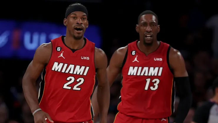 Jimmy Butler #22 and Bam Adebayo #13 of the Miami Heat celebrate in the second half of game one of the Eastern Conference Semifinals against the New York Knicks at Madison Square Garden on April 30, 2023 in New York City. The Miami Heat defeated the New York Knicks 108-101.
