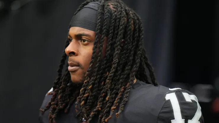 Wide receiver Davante Adams #17 of the Las Vegas Raiders walks onto the field before a preseason game against the Minnesota Vikings at Allegiant Stadium on August 14, 2022 in Las Vegas, Nevada.
