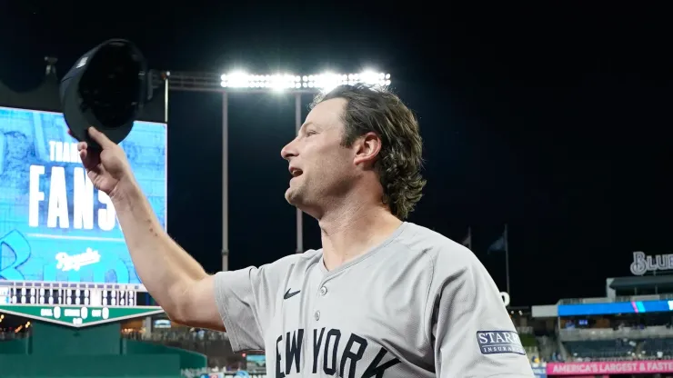 Gerrit Cole #45 of the New York Yankees celebrates after a win over the Kansas City Royals during Game Four of the Division Series at Kauffman Stadium on October 10, 2024 in Kansas City, Missouri.
