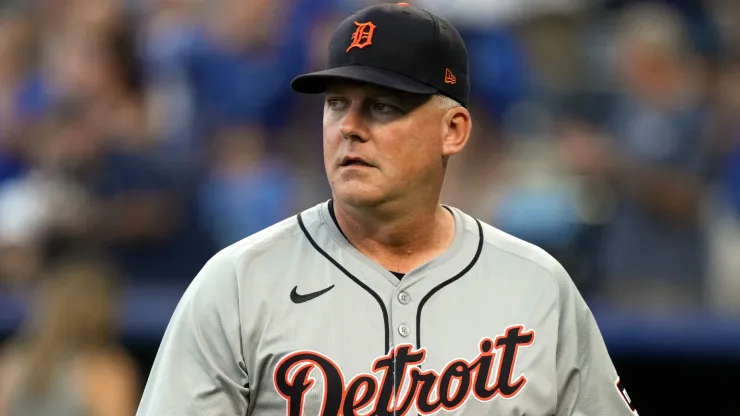 Manager A.J. Hinch #14 of the Detroit Tigers walks back to the dugout after delivering the starting lineup prior to a game against the Kansas City Royals at Kauffman Stadium on September 16, 2024 in Kansas City, Missouri. 
