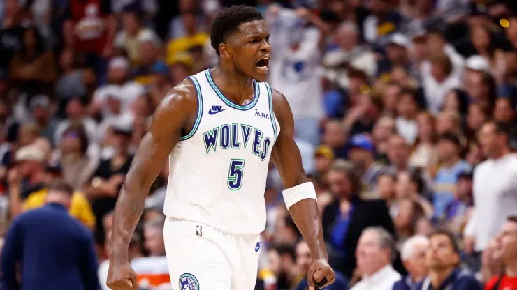 Anthony Edwards #5 of the Minnesota Timberwolves celebrates a three point basket
