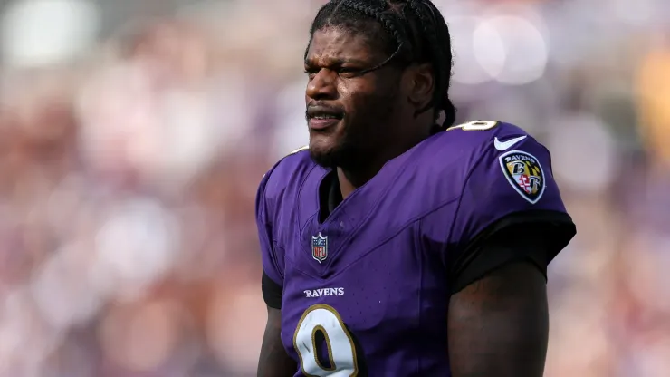 Lamar Jackson #8 of the Baltimore Ravens looks on as they play the Washington Commanders at M&T Bank Stadium on October 13, 2024 in Baltimore, Maryland.
