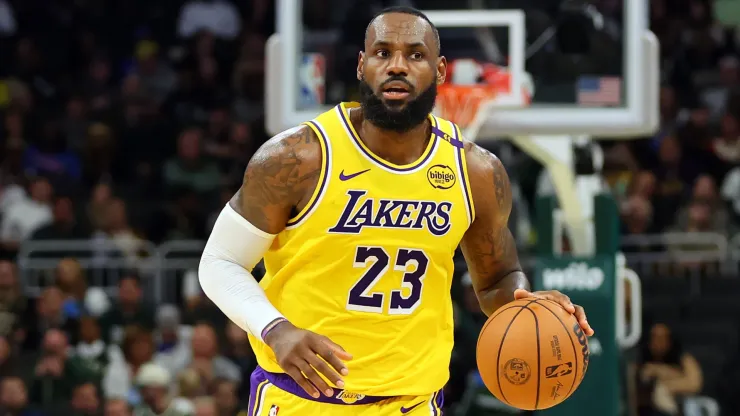 LeBron James #23 of the Los Angeles Lakers handles the ball during a preseason game against the Milwaukee Bucks
