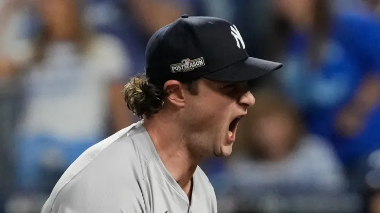 Gerrit Cole #45 of the New York Yankees reacts during the seventh inning against the Kansas City Royals during Game Four of the Division Series at Kauffman Stadium on October 10, 2024 in Kansas City, Missouri.
