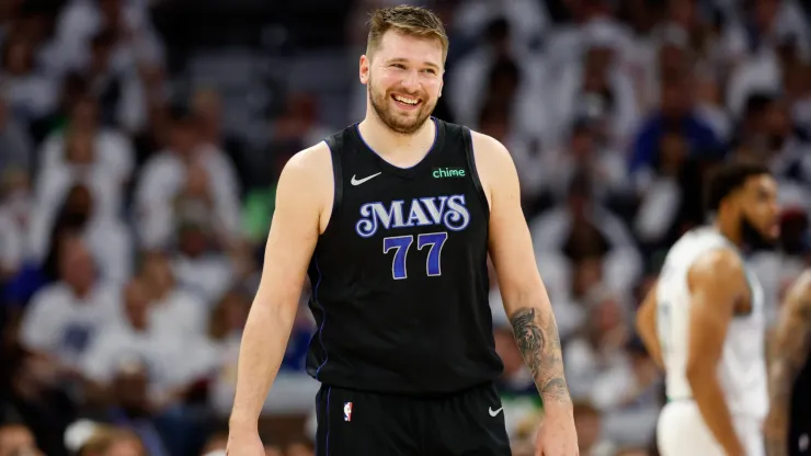 Luka Doncic #77 of the Dallas Mavericks reacts during the third quarter against the Minnesota Timberwolves
