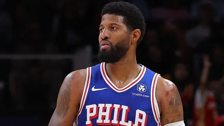 Paul George #8 of the Philadelphia 76ers brings the ball up the court against the Atlanta Hawks during the second quarter at State Farm Arena on October 14, 2024 in Atlanta, Georgia. 
