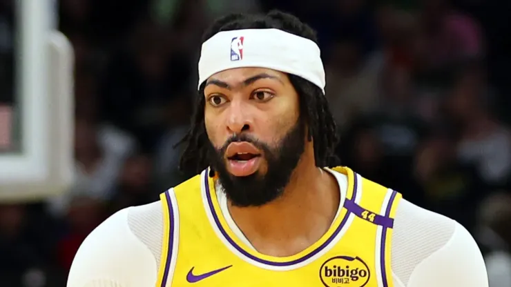 Anthony Davis #3 of the Los Angeles Lakers handles the ball during a preseason game against the Milwaukee Bucks at Fiserv Forum on October 10, 2024 in Milwaukee, Wisconsin.
