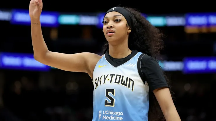 Angel Reese #5 of the Chicago Sky looks on during the game against the Seattle Storm
