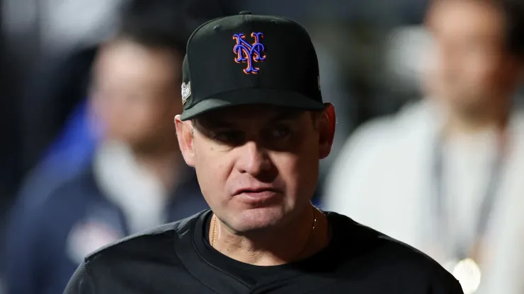 Manager Carlos Mendoza of the New York Mets walks through the dugout before Game Three of the National League Championship Series against the Los Angeles Dodgers at Citi Field on October 16, 2024 in New York City. 
