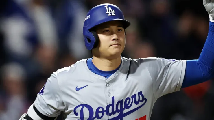 Shohei Ohtani #17 of the Los Angeles Dodgers celebrates after hitting a home run in the eighth inning against the New York Mets during Game Three of the National League Championship Series at Citi Field on October 16, 2024 in New York City. 
