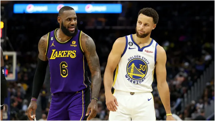 LeBron James of the Los Angeles Lakers speaks to Stephen Curry of the Golden State Warriors
