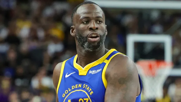 Draymond Green #23 of the Golden State Warriors looks to pass against the Los Angeles Lakers in the second quarter of their preseason game at T-Mobile Arena at T-Mobile Arena on October 15, 2024 in Las Vegas, Nevada. The Warriors defeated the Lakers 111-97. 
