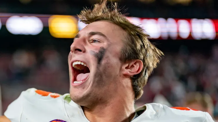 Cade Klubnik #2 of the Clemson Tigers celebrates after defeating the South Carolina Gamecocks during their game at Williams-Brice Stadium on November 25, 2023 in Columbia, South Carolina.
