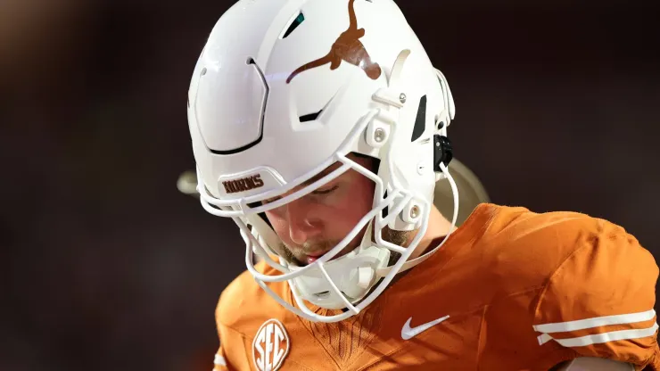 Quinn Ewers #3 of the Texas Longhorns walks off the field after being defeated by the Georgia Bulldogs 30-15 at Darrell K Royal-Texas Memorial Stadium on October 19, 2024 in Austin, Texas.
