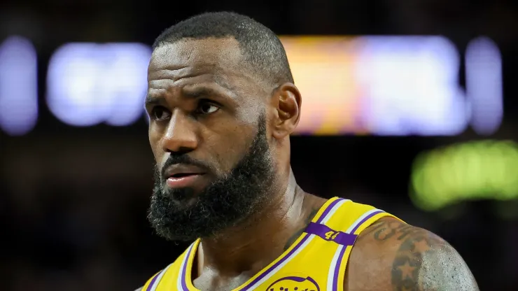 LeBron James #23 of the Los Angeles Lakers walks on the court during a break in the third quarter of a preseason game against the Golden State Warriors at T-Mobile Arena at T-Mobile Arena on October 15, 2024 in Las Vegas, Nevada. The Warriors defeated the Lakers 111-97. NOTE TO USER: User expressly acknowledges and agrees that, by downloading and or using this photograph, User is consenting to the terms and conditions of the Getty Images License Agreement.
