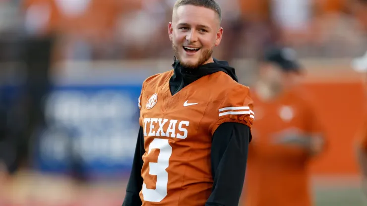 Quinn Ewers #3 of the Texas Longhorns watches players warm up before the game against the Louisiana Monroe Warhawks at Darrell K Royal-Texas Memorial Stadium on September 21, 2024 in Austin, Texas.
